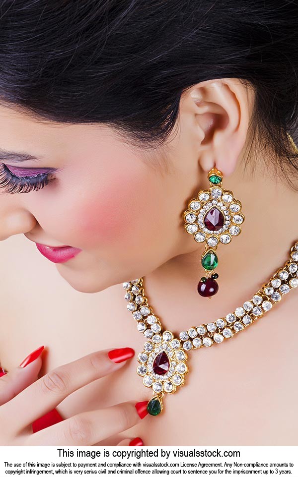 Beautiful woman wearing Necklace And Earring Jewel