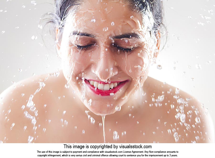Beautiful woman washing Cleaning face water