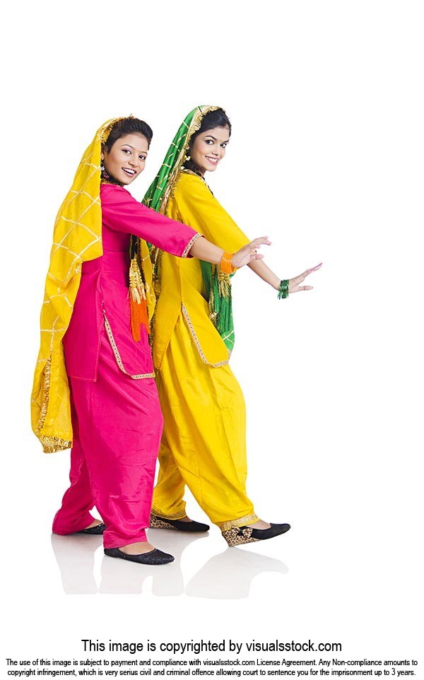 Two Punjabi women in-traditional Dress Doing Bhangra Dance on-Lohri ...