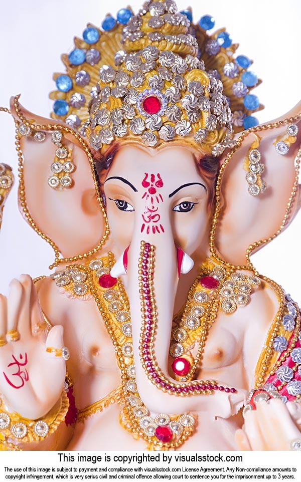 Hindu Elephant God-Lord Ganesha statue against white background on-Ganesh  Chaturthi