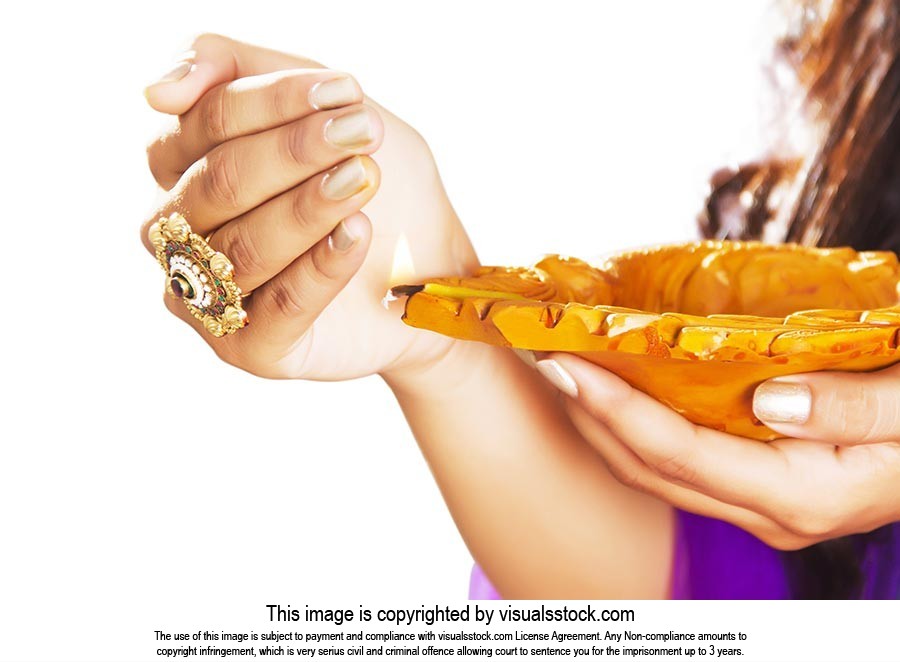 Woman Hand Holding Diya Diwali