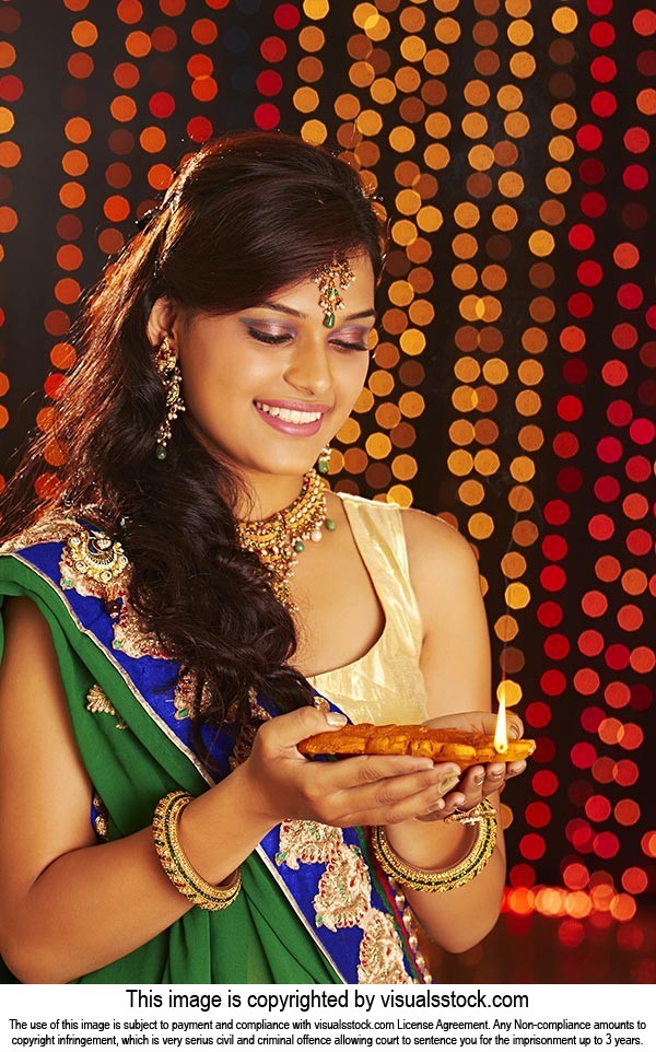 Indian Woman Holding Diwali Diya