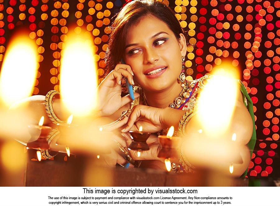 Woman Diwali Festaval Taking Phone