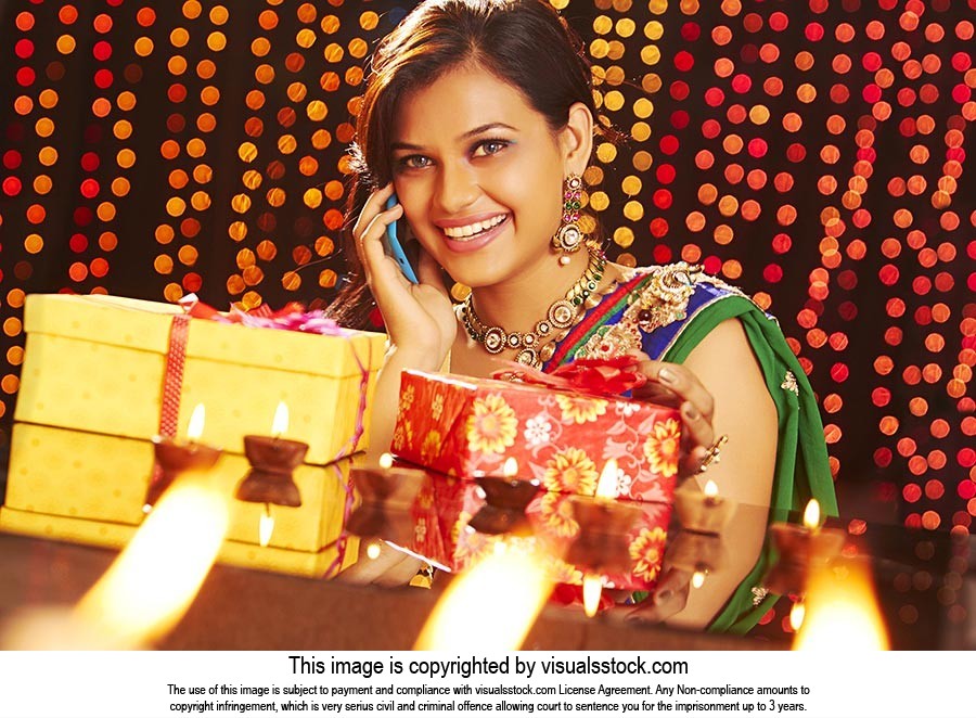 Lady Diwali Gift Taking Phone