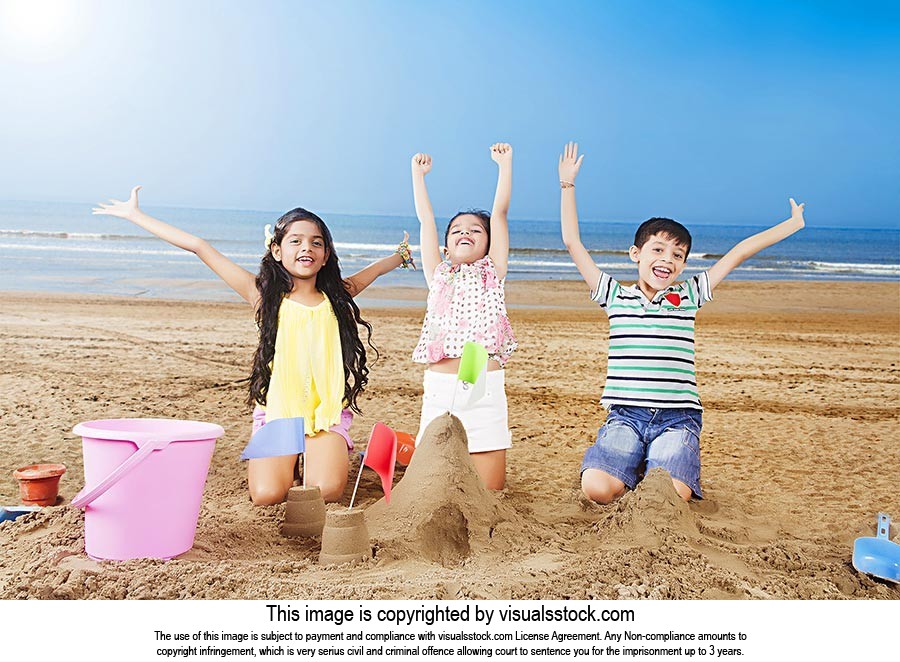 3-5 People ; Arms Raised ; Beach ; Boys ; Brother 