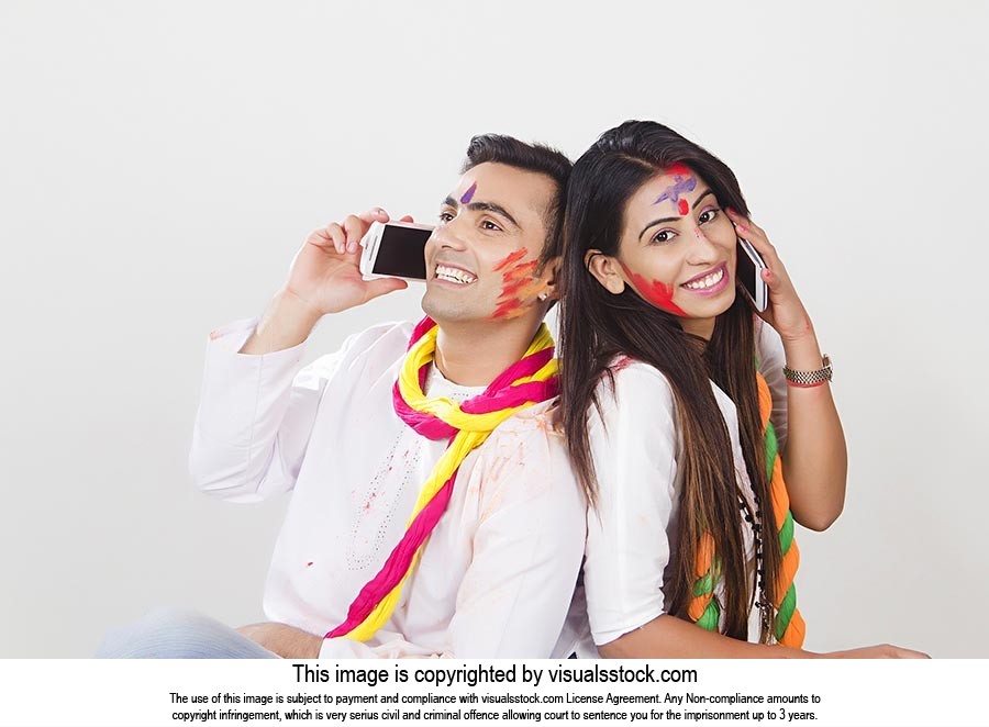Couple Holi Celebrating Enjoy Talking Phone Smilin
