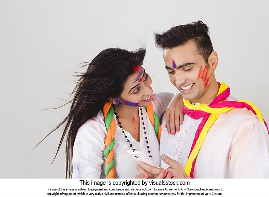 Couple Holi Celebrating Fun Text Messaging Phone