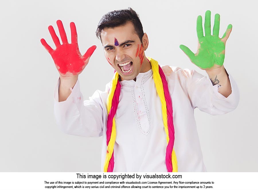 Shouting Man showing Colour hands Holi festival Fu
