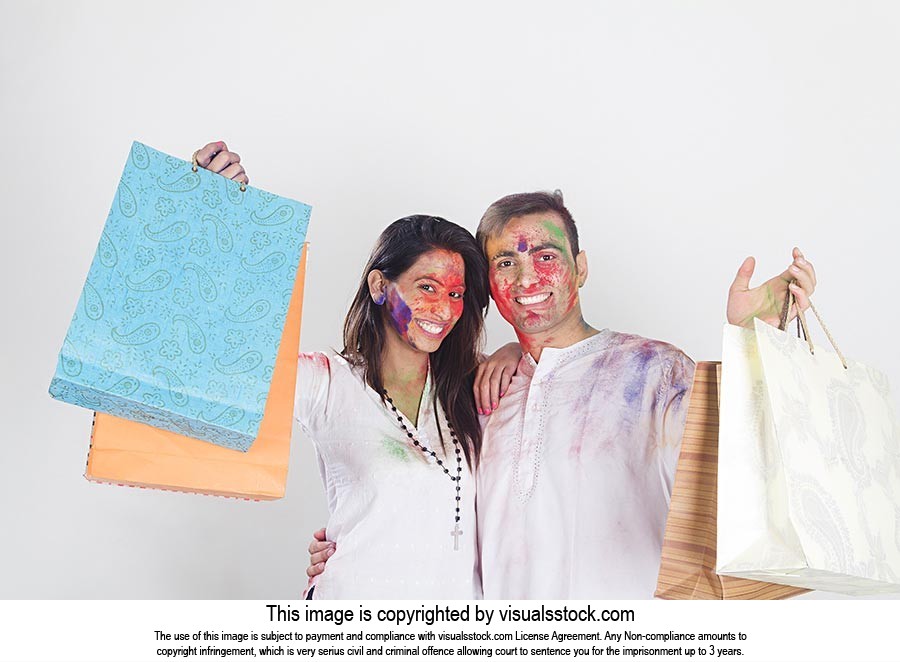 Happy Couple Holi Festival Shopping Bags Showing