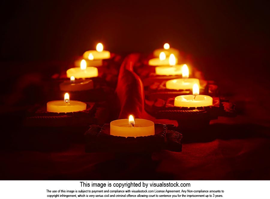Abundance ; Arranging ; Bright ; Burning ; Candles
