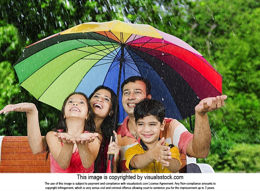 Family Under Umbrella Outdoors Rain Enjoy