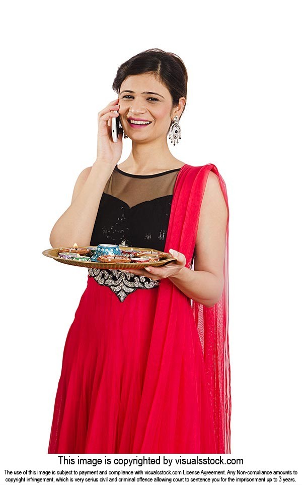 Woman Holding Plate Talking Phone Diwali