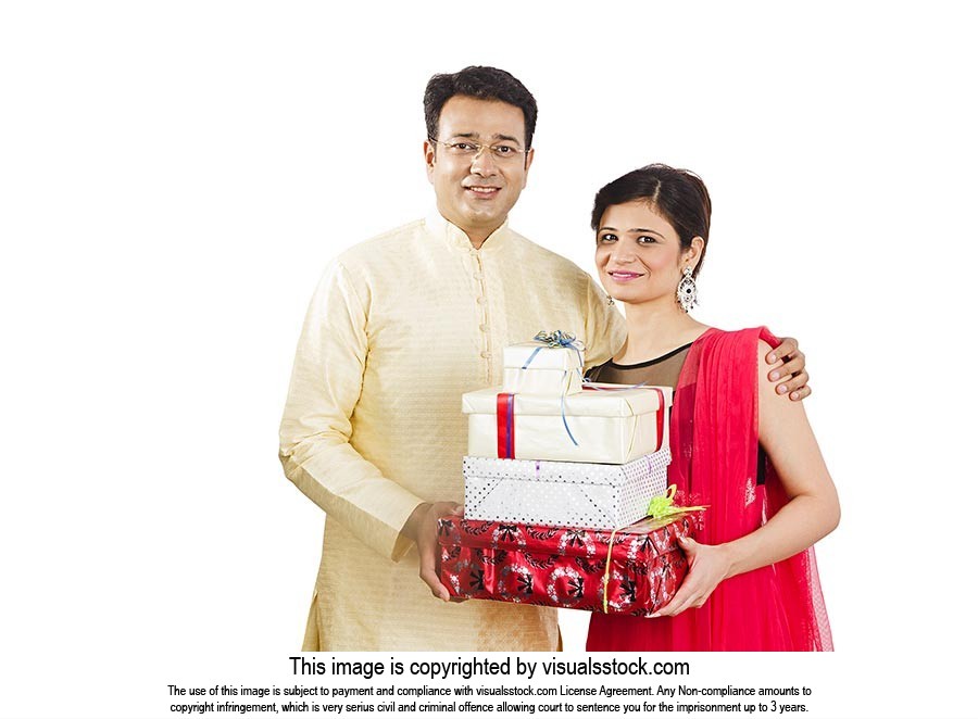 Portrait Couple Holding Gift Boxes