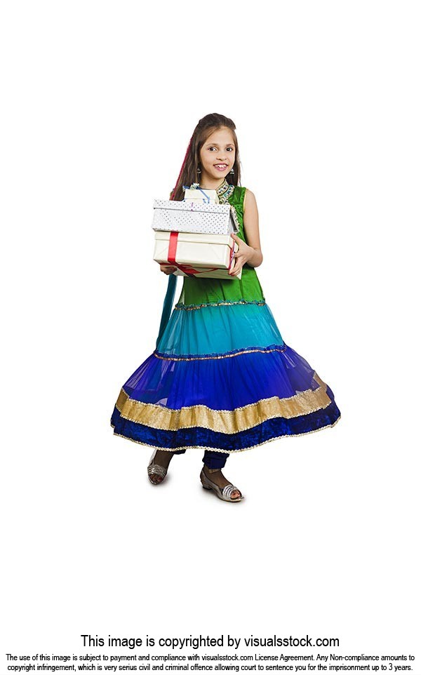 Little Girl Holding Gifts During Diwali Festival