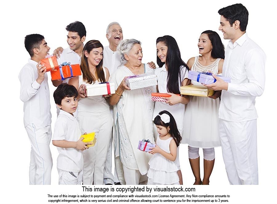 Indian Joint family Holding Gift Boxes