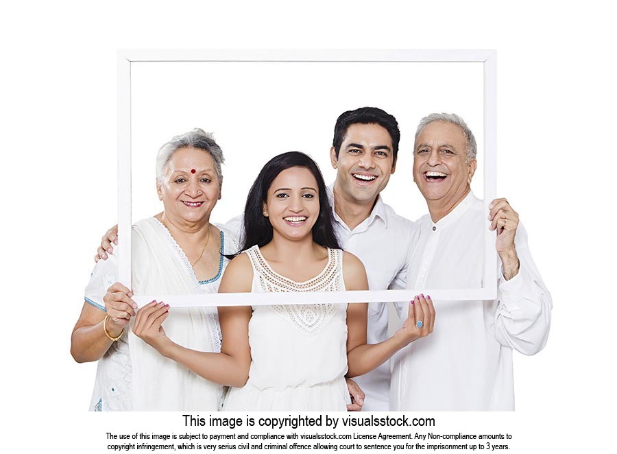 Happy Indian Family Holding Frame