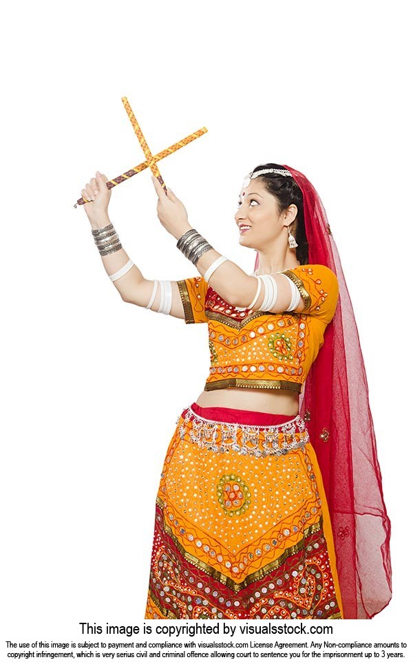 Woman Chaniya Choli Performing Dandiya Raas