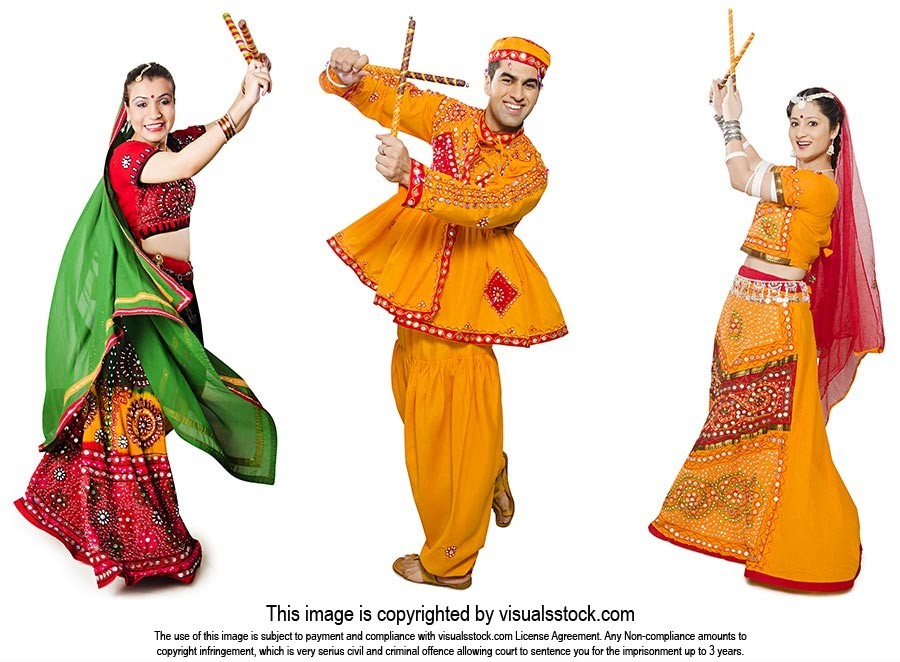Men Women Performing Dandiya Navratri Celebrations