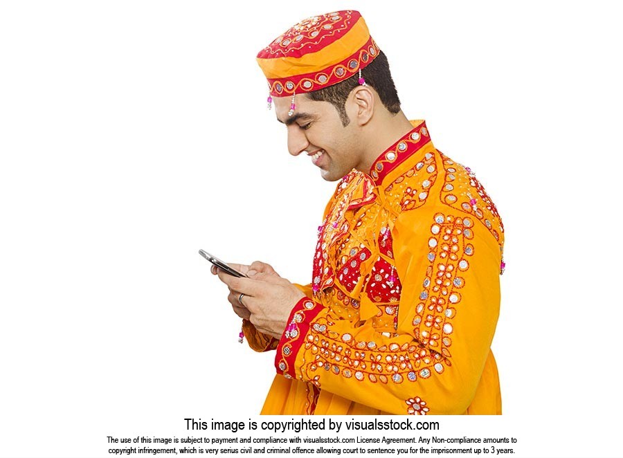 Traditional Gujrati Man Reading Message Phone