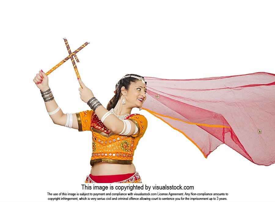 Gujarati Woman Dancer Performing Dandiya Dance