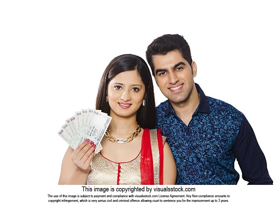 Happy Indian Couple Showing Money