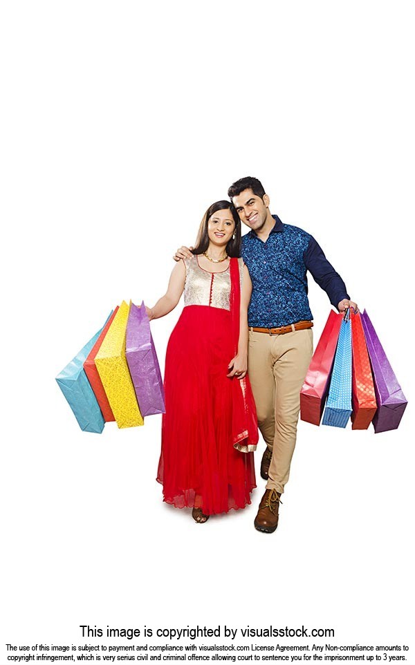 Happy Indian Couple Shopping Bags Walking