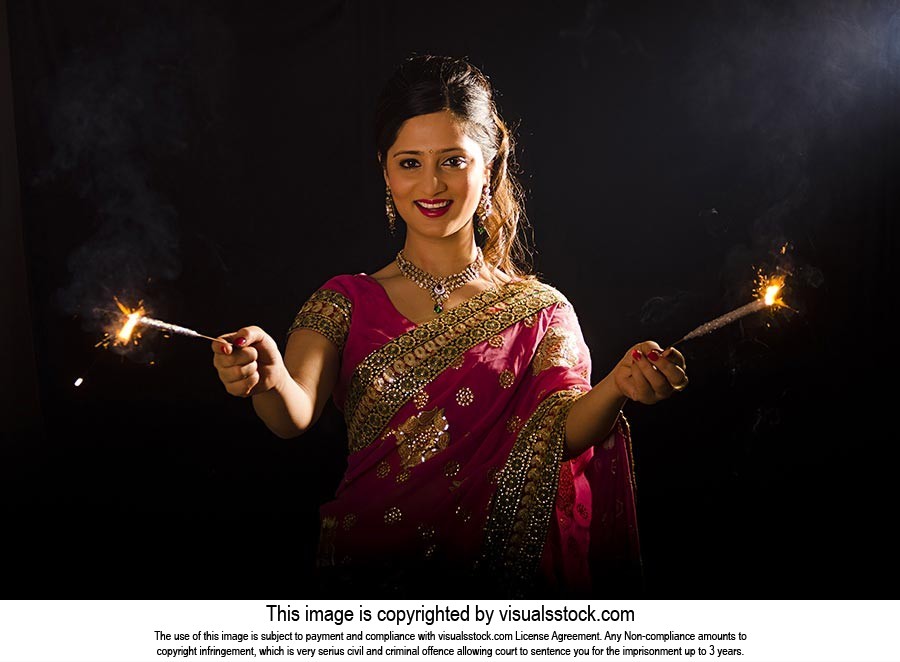 Indian Woman Burning Firecrackers Diwali Celebrati