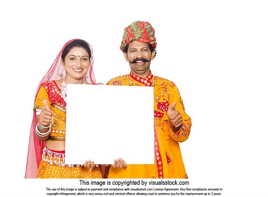 Gujrati Couple Showing Whiteboard