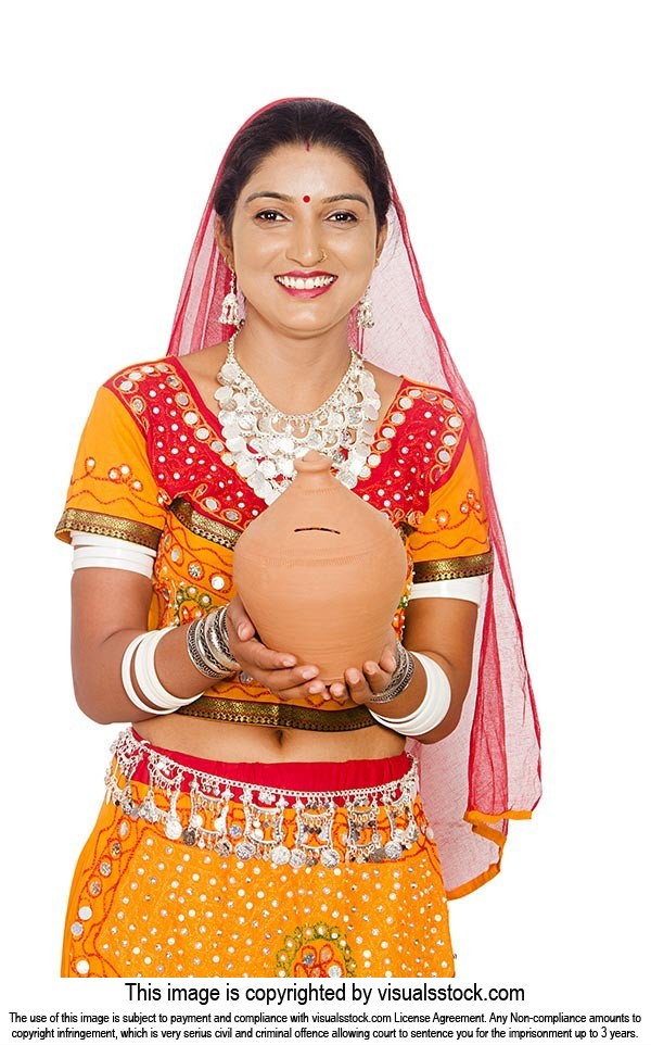 Rajasthani Woman Holding Piggybank