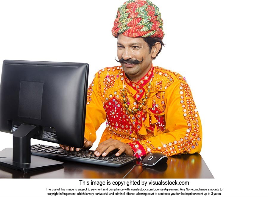 Gujrati Man Learning Computer