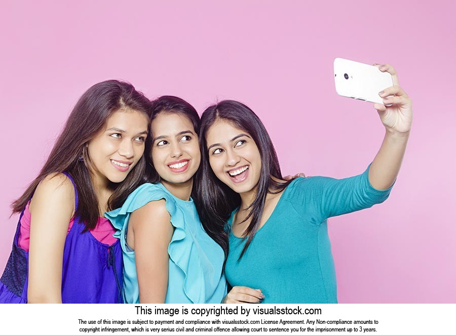 Teenage Girls Taking Selfie