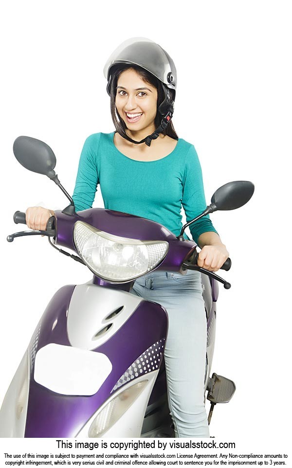 Young Girl Riding Scooty