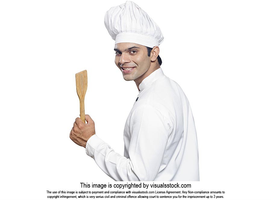 Indian Man Chef Showing Spatula Smiling