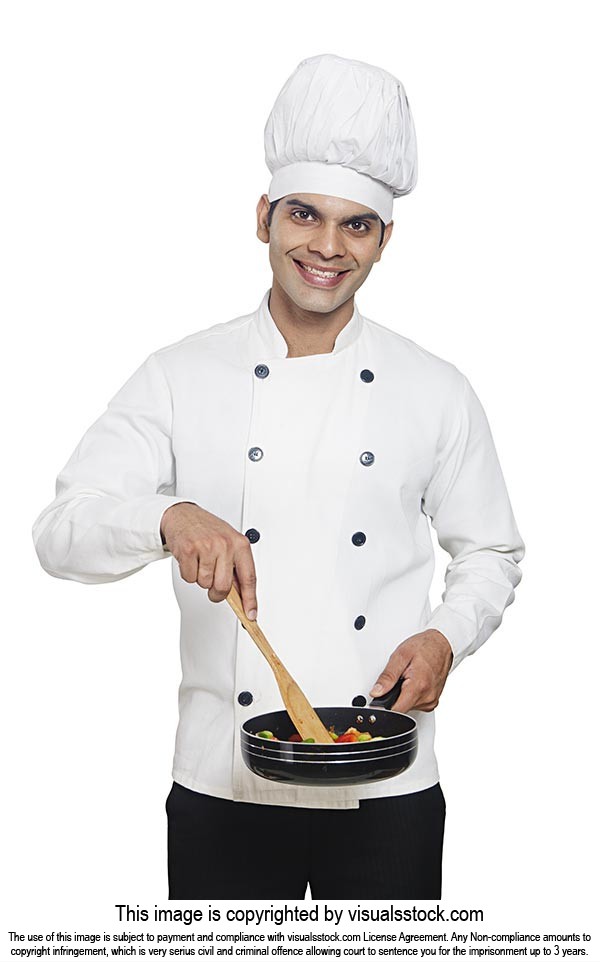 Male Chef Cooking Frying Vegetables