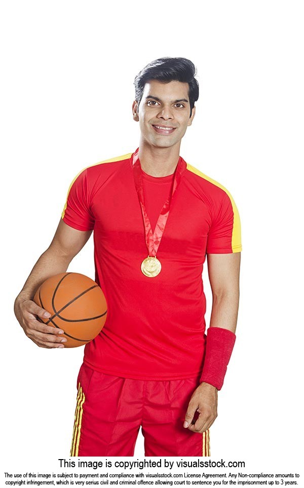 Smiling Basketball Player Medal Holding Ball