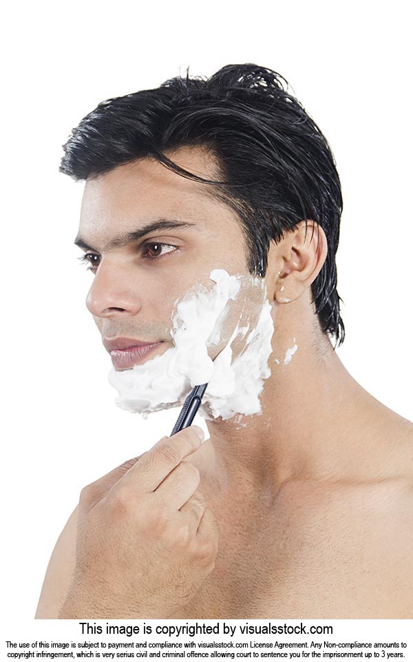 Handsome Man Shaving Cream Face Using Razor