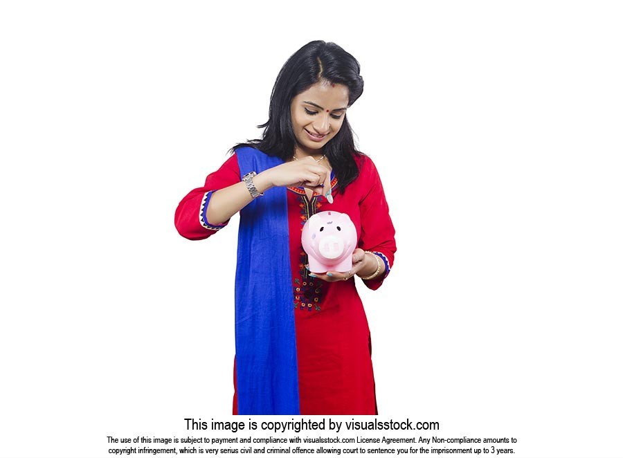 Woman Inserting Coin Piggy Bank