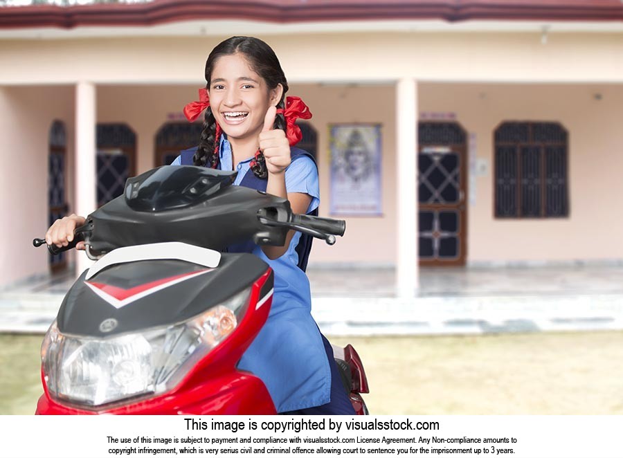 School Girl Riding Scooty