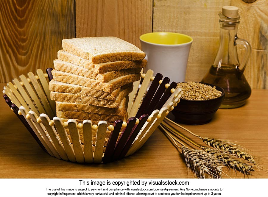 Abundance ; Arranging ; Basket ; Bottle ; Bread ; 