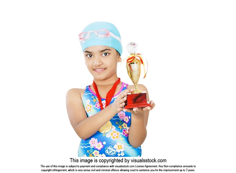 Portrait of Little-girl swimmer Showing swim trophy Winning Success  Celebration