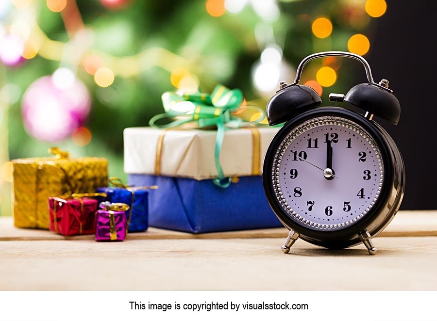 Close-up of Alarm Clock Time with gift-boxes on-Christmas festival ...