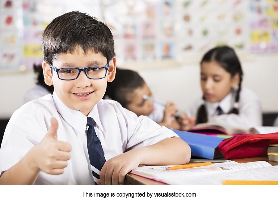 Indian Students Studying In Classroom