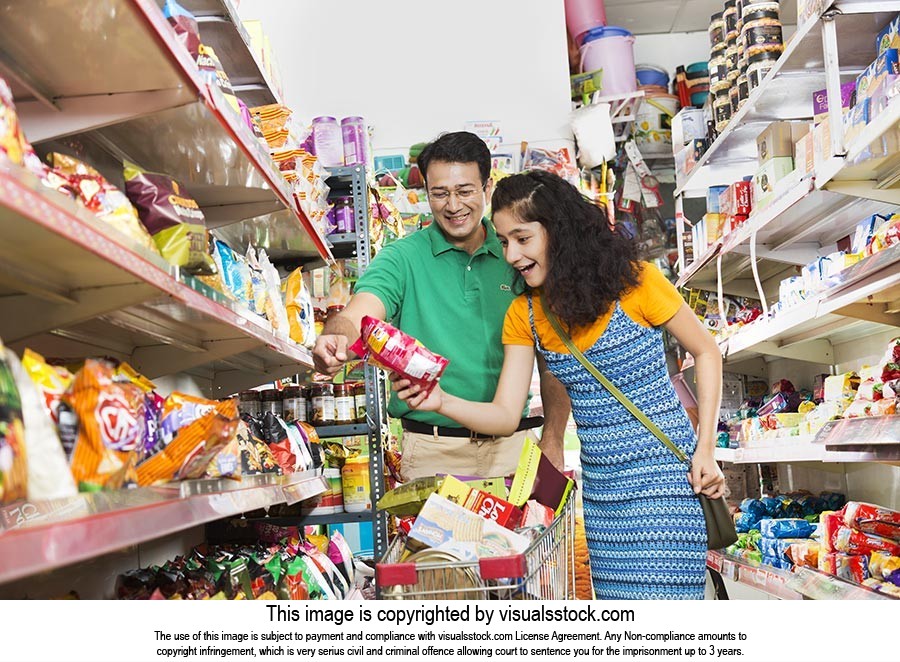 Indian Father And Daughter With Shopping-cart Checking price Grocery ...