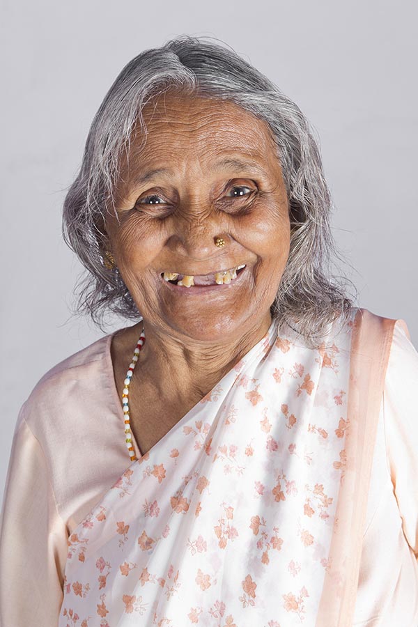 Portrait-of old woman Senior Indian woman and smiling on-white background