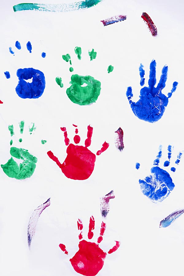 Holi card with Colourful hand prints happy Holi