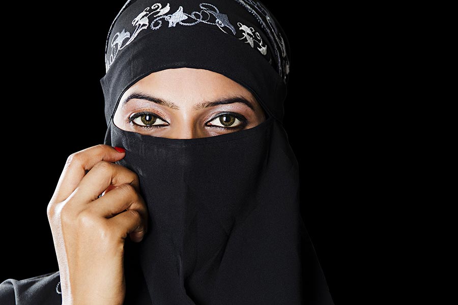 Close-up Beautiful asian muslim woman in hijab with face covering