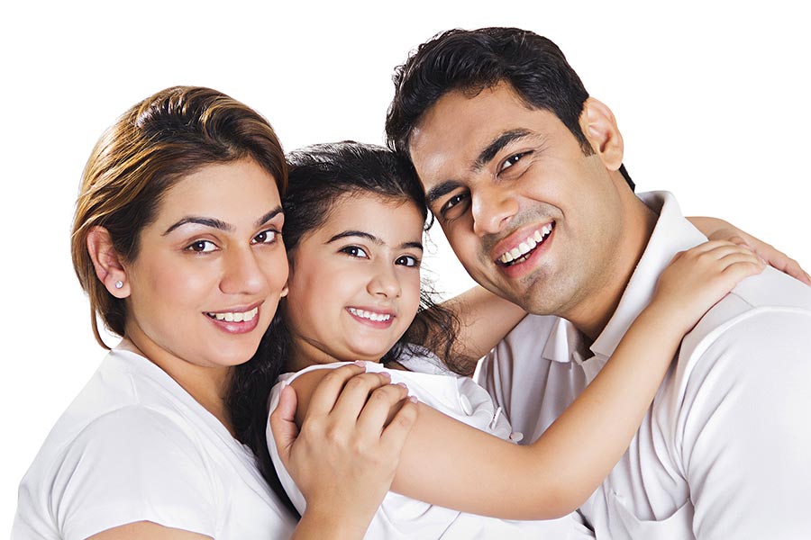 Happy Indian Family Father hugging his Daughter With Mother