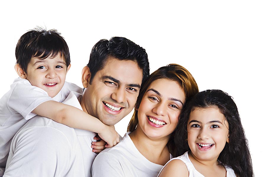 Indian Family Father Mother And Children Sitting Together Queue S Smiling