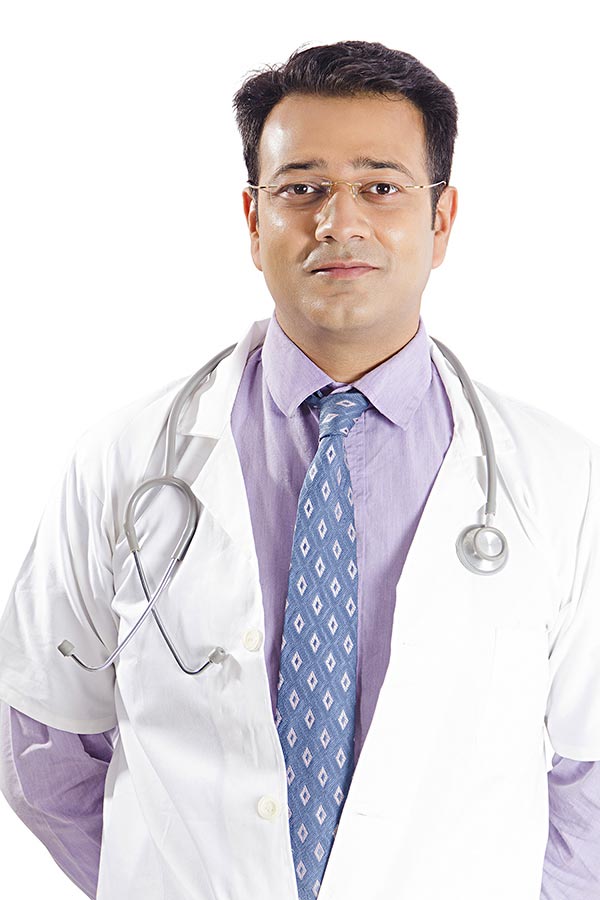 Indian Medical Male Doctor with stethoscope In-Uniform Standing on ...