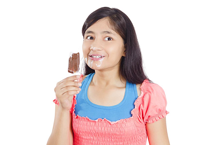 Happy Young-Girl Eating Delicious Ice-Cream Melting ice-cream Mouth ...